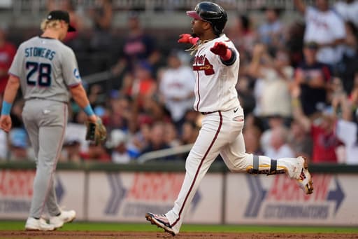 Albies and Riley homer, Braves beat Marlins 4-2 behind Grant Holmes’ 6 scoreless innings
