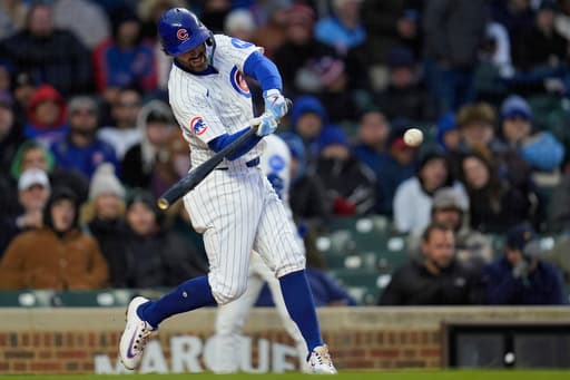 Swanson hits tiebreaking single in 4-run eighth as the Cubs beat the Rangers 10-6