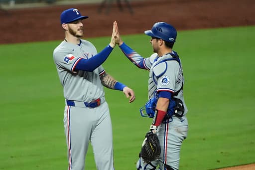 Kyle Higashioka has a 3-run double in the 9th to help the Rangers beat the Royals 6-3