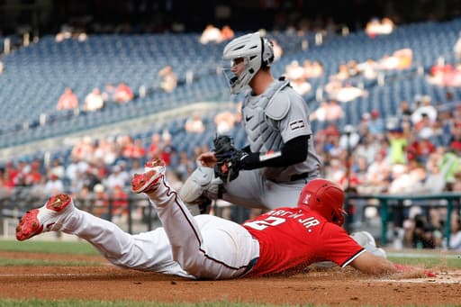 Nathaniel Lowe’s 3-run triple helps Nationals past AL-leading Tigers 9-4 for a doubleheader split