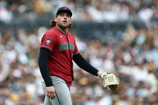 Arizona Diamondbacks pitcher Kevin Ginkel watches a foul ball in the seventh inning of a baseball game against the San Diego Padres, Sunday, Sept. 27, 2026, in San Diego. (AP Photo/Karl Anderson) (AP Photo/Karl Anderson)