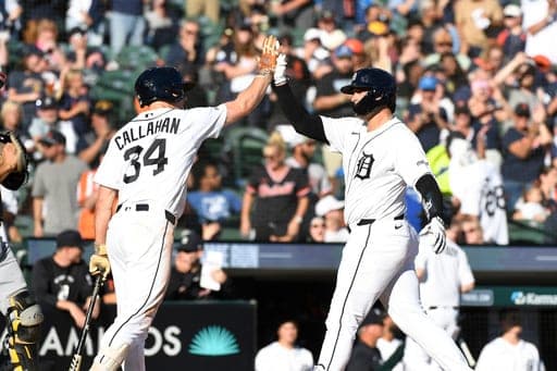 Detroit Tigers' Eduardo Valencia, right, is congratulated by Brett Callahan after hitting a home run during the seventh inning of a baseball game against the Pittsburgh Pirates, Sunday, Sept. 27, 2026, in Detroit. (AP Photo/Jose Juarez) (AP Photo/Jose Juarez)