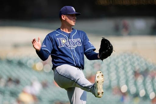 Tampa Bay Rays pitcher Tyler Wells watches the final out against the Detroit Tigers during the ninth inning of a baseball game Wednesday, Aug. 26, 2026, in Detroit. (AP Photo/Paul Sancya) (AP Photo/Paul Sancya)