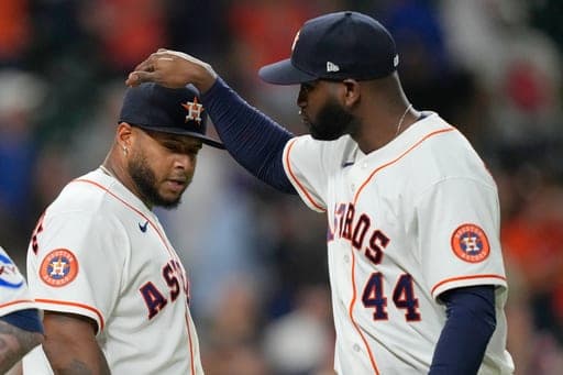 Houston Astros' Yordan Alvarez (44) and Nelson Velázquez celebrate after a baseball game against the Chicago White Sox Wednesday, Sept. 2, 2026, in Houston. (AP Photo/David J. Phillip) (AP Photo/David J. Phillip)