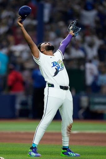 Tampa Bay Rays third baseman Junior Caminero celebrates their win against the Cleveland Guardians in Game 2 of an American League Championship Series baseball game in St. Petersburg, Fla. Tuesday, Oct. 13, 2026. (AP Photo/David J. Phillip) (AP Photo/David J. Phillip)