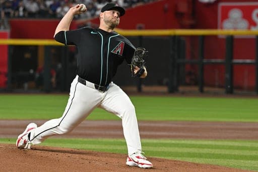 Arizona Diamondbacks' Corbin Burnes pitches during the first inning of a baseball game against the New York Yankees, Sunday, Sept. 20, 2026, in Phoenix. (AP Photo/Caitlin O'Hara) (AP Photo/Caitlin O'Hara)