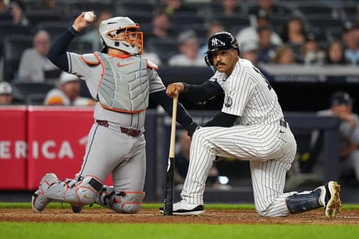 New York Yankees' Trent Grisham reacts after an inside pitch during the sixth inning of a baseball game against the Houston Astros Tuesday, Aug. 25, 2026, in New York. (AP Photo/Frank Franklin II) (AP Photo/Frank Franklin II)