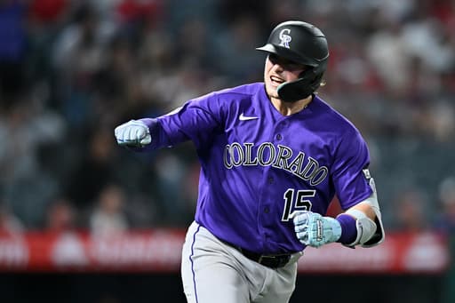 Goodman’s 3-run homer and Rumfield’s sac fly help Rockies rally for 9-8 win over Angels