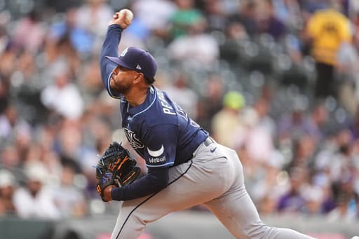 Peralta roughed up in Rays debut but Hicks hits grand slam and Tampa Bay rallies past Rockies in 11
