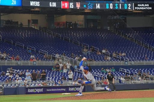 New York Mets relief pitcher Tobias Myers (32) aims a pitch during the ninth inning of a baseball game against the Miami Marlins Wednesday, Sept. 9, 2026, in Miami. (AP Photo/Marta Lavandier) (AP Photo/Marta Lavandier)