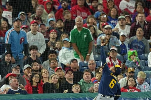 Milwaukee Brewers third baseman David Hamilton catches a pop-foul out by Philadelphia Phillies' Bryce Harper during the fifth inning of a baseball game, Wednesday, Sept. 23, 2026, in Philadelphia. (AP Photo/Matt Rourke) (AP Photo/Matt Rourke)
