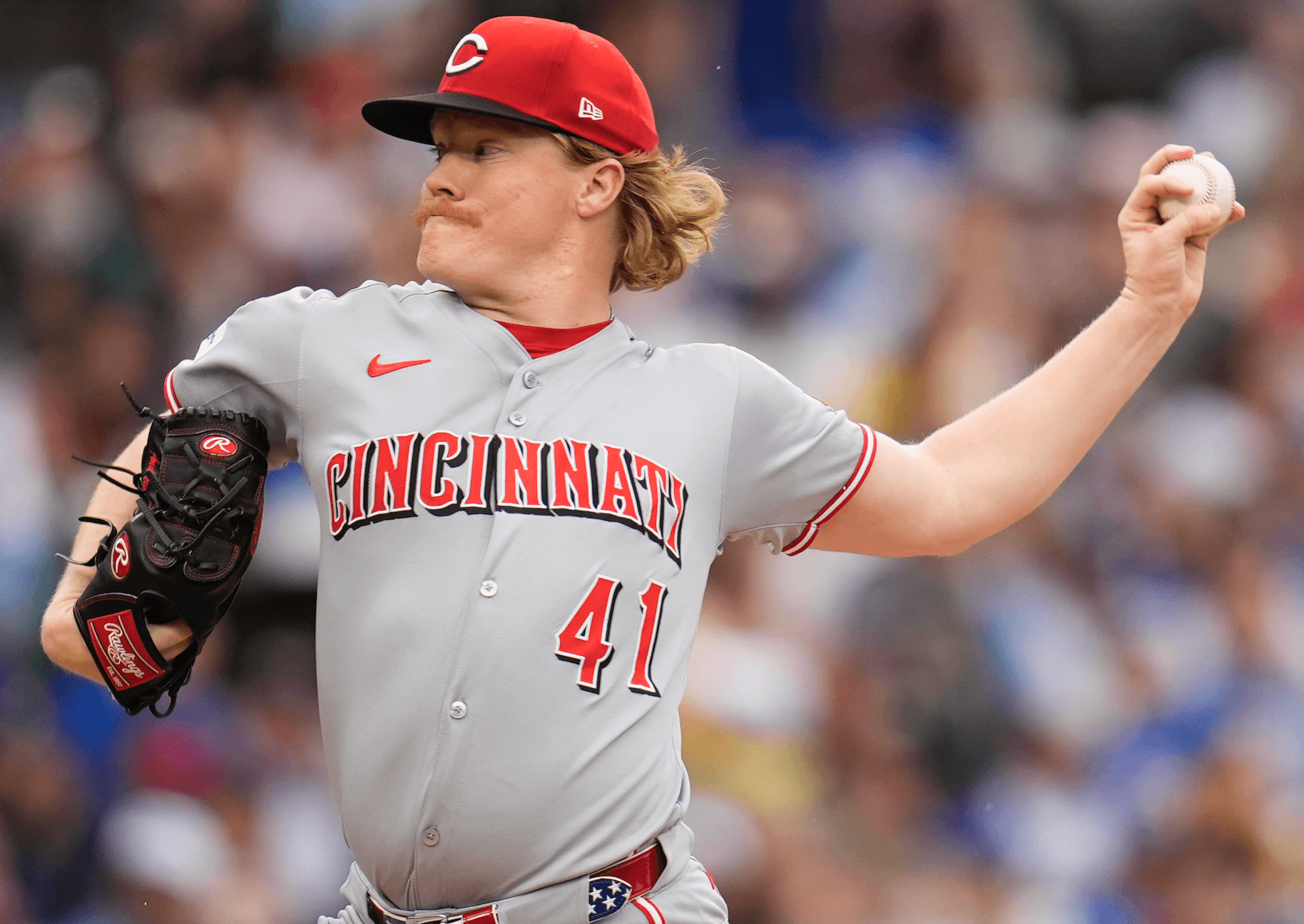 Abbott pitches 7 crisp innings as the Reds hold off the Cubs