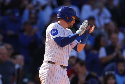 Ian Happ de los Cachorros de Chicago celebra trasn anotar una carrera ante los Marlins de Miami, el jueves 24 de septiembre de 2026, en Chicago. (AP Foto/Melissa Tamez) (AP Photo/Melissa Tamez)