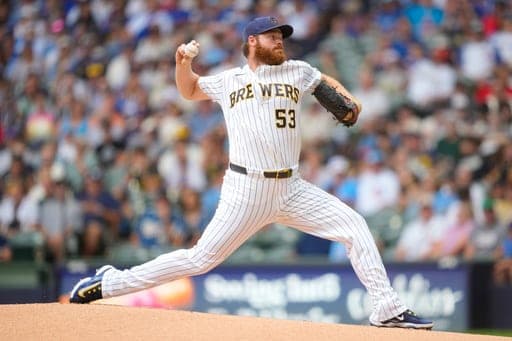 FILE - Milwaukee Brewers pitcher Brandon Woodruff throws during the first inning of a baseball game against the Chicago Cubs, June 28, 2026, in Milwaukee. (AP Photo/Kayla Wolf, File) (AP Photo/Kayla Wolf)