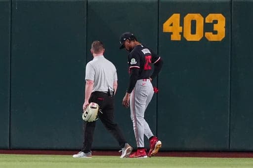 Minnesota Twins center fielder Byron Buxton (25) leaves the game during a baseball game against the Athletics Tuesday, Aug. 25, 2026, in West Sacramento, Calif. (AP Photo/Alan Greth) (AP Photo/Alan Greth)