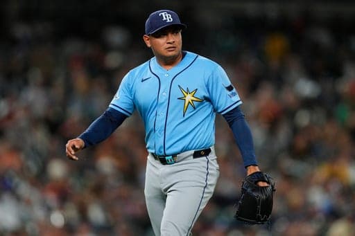 Tampa Bay Rays pitcher Manuel RodrÌguez walks to the dugout against the Detroit Tigers during the eighth inning of a baseball game Monday, Aug. 24, 2026, in Detroit. (AP Photo/Paul Sancya) (AP Photo/Paul Sancya)