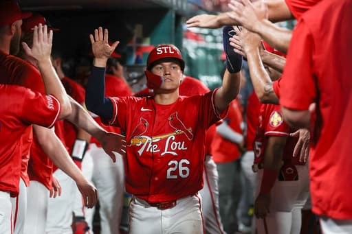 Cardinals outlast the Braves 2-1 early Saturday after a long rain delay