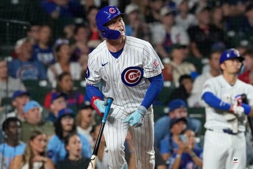 Chicago Cubs' Pete Crow-Armstrong watches his solo home run during the ninth inning of a baseball game against the Cincinnati Reds in Chicago, Sunday, Aug. 30, 2026. (AP Photo/Nam Y. Huh) (AP Photo/Nam Y. Huh)