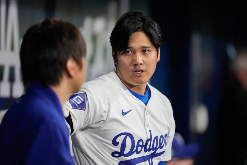 Ohtani to begin throwing program soon. Roberts hints Dodgers star might play in the field