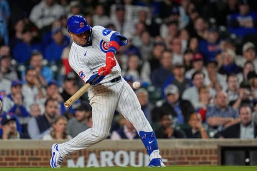 Happ hits game-ending single in the 10th as the Cubs rally past Dodgers 11-10