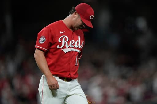 Reds closer Emilio Pagán appears to be injured on final pitch