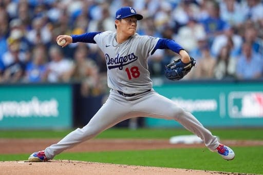 Los Angeles Dodgers pitcher Yoshinobu Yamamoto throws during the first inning of Game 2 of baseball's National League Championship Series between the Milwaukee Brewers and the Los Angeles Dodgers, Monday, Oct. 12, 2026, in Milwaukee. (AP Photo/Abbie Parr) (AP Photo/Abbie Parr)