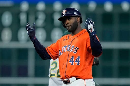 Houston Astros' Yordan Alvarez celebrates after hitting an RBI double during the seventh inning of a baseball game against the Athletics, Friday, Aug. 21, 2026, in Houston. (AP Photo/Kevin M. Cox) (AP Photo/Kevin M. Cox)