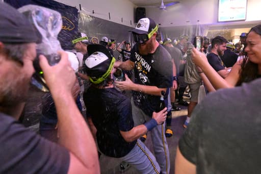Brewers celebrate 3rd straight NL Central title, driven by underdog status