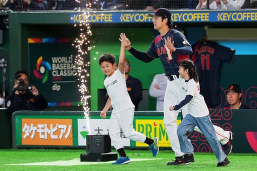 Ohtani hits a grand slam as Japan routs Taiwan 13-0 in a game stopped after 7 by mercy rule