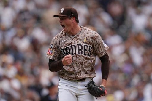 San Diego Padres pitcher Mason Miller celebrates after the Padres defeated the New York Yankees 4-3 in a baseball game Sunday, Sept. 6, 2026, in San Diego. (AP Photo/Gregory Bull) (AP Photo/Gregory Bull)