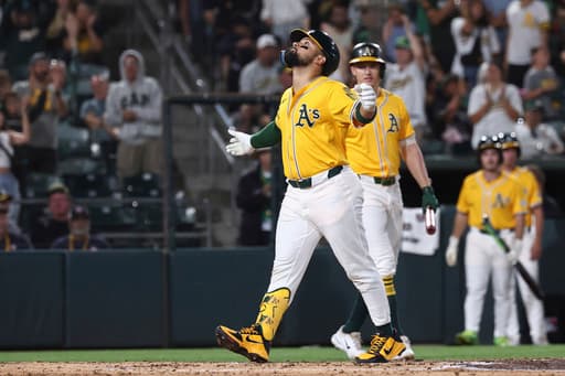 Athletics beat Reds 3-0 as Carlos Cortes hits 2 homers
