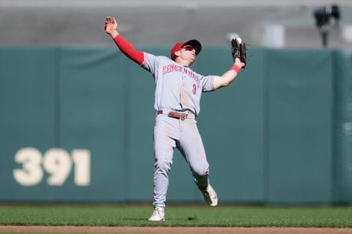 Cincinnati Reds second baseman Matt McLain (9) catches a pop out hit by San Francisco Giants' Buddy Kennedy during the ninth inning of a baseball game, Wednesday, Aug. 26, 2026, in San Francisco. (AP Photo/Jeff Chiu) (AP Photo/Jeff Chiu)
