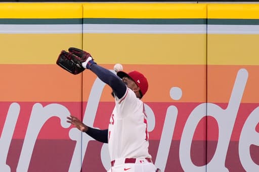 Rumfield gets gift homer when flyball bounces off Adell’s head as Rockies top Angels 8-2