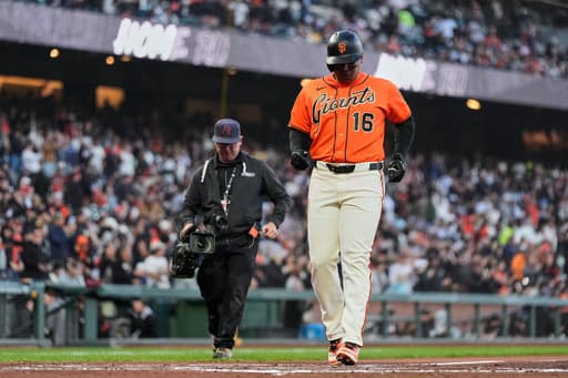 Rafael Devers goes deep and Robbie Ray pitches the Giants to a 5-2 win over the Pirates