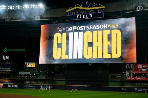 A message is displayed to signify the Milwaukee Brewers clinching a postseason berth after a baseball game against the Cincinnati Reds, Friday, Sept. 11, 2026, in Milwaukee. (AP Photo/Aaron Gash) (AP Photo/Aaron Gash)