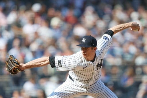 New York Yankees pitcher Tim Hill throws during the eighth inning of a baseball game against the New York Mets, Saturday, Sept. 12, 2026, in New York. (AP Photo/Heather Khalifa) (AP Photo/Heather Khalifa)
