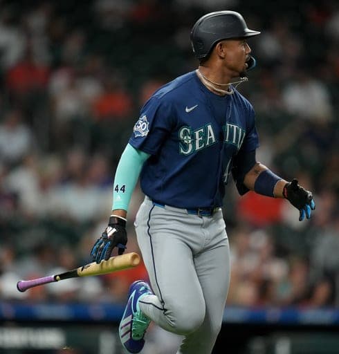 Seattle Mariners' Julio Rodriguez watches his double against Houston Astros relief pitcher Bryan Abreu during the seventh inning of a baseball game, Sunday, Aug. 16, 2026, in Houston. (AP Photo/Karen Warren) (AP Photo/Karen Warren)
