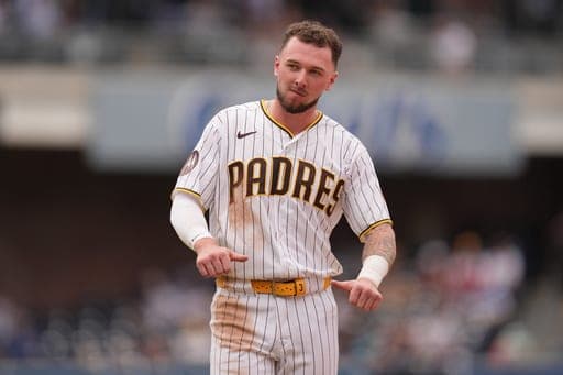 San Diego Padres' Jackson Merrill jokes at the end of the eighth inning of a baseball game against the Washington Nationals Wednesday, Sept. 9, 2026, in San Diego. (AP Photo/Gregory Bull) (AP Photo/Gregory Bull)