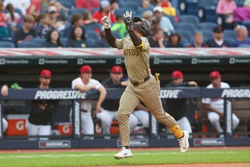 San Diego Padres' Jase Bowen celebrates after hitting a home run in the eighth inning of a baseball game against the Cleveland Guardians in Cleveland, Sunday, Aug. 16, 2026. (AP Photo/Tim Phillis) (AP Photo/Tim Phillis)