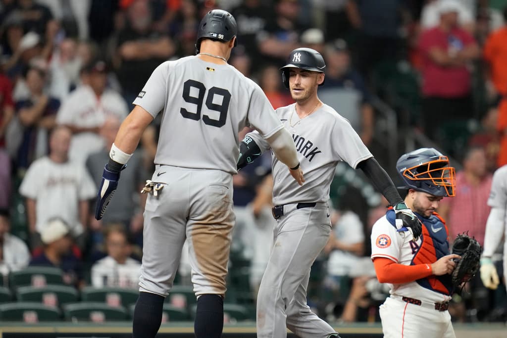 Title: Yankees Astros Baseball Image ID: 25247132927990 Article: New York Yankees' Cody Bellinger (35) celebrates his three-run home run with Aaron Judge against Houston Astros relief pitcher Bryan Abreu during the ninth inning of a baseball game Wednesday, Sept. 3, 2025, in Houston. (AP Photo/Karen Warren)
