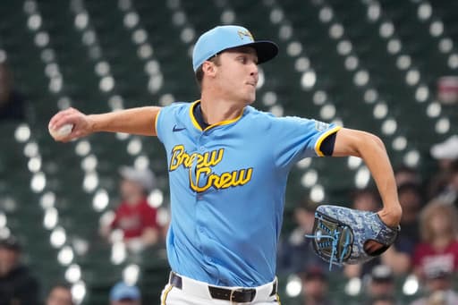 Misiorowski dominates before departing MLB debut with leg cramps as Brewers blank Cardinals 6-0
