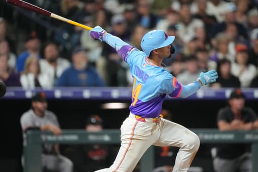 Tovar, Goodman homer in 5-run 9th, Rockies beat Giants 8-6
