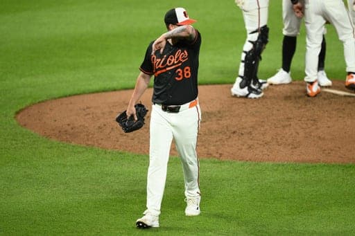 Baltimore Orioles pitcher Kyle Bradish walks back to the dugout after he was pulled during the sixth inning of a baseball game against the New York Yankees, Thursday, Aug. 20, 2026, in Baltimore. (AP Photo/Nick Wass) (AP Photo/Nick Wass)