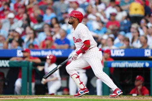 Philadelphia Phillies' Luis Arraez watches his two-run home run off Miami Marlins pitcher Sandy Alcantara during the third inning of a baseball game, Wednesday, Aug. 19, 2026, in Philadelphia. (AP Photo/Derik Hamilton) (AP Photo/Derik Hamilton)