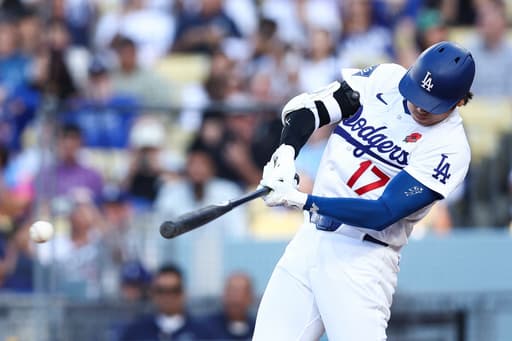 Freddie Freeman sparks a 4-run seventh as the Dodgers rally past the Rockies 5-3
