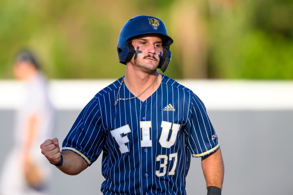FIU catcher Brendan Roney gestures as he rounds the bases after scoring against New Mexico State in April 2025. He is now a volunteer coach on the Panthers staff.