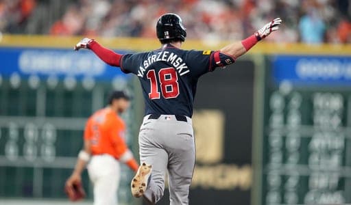 Atlanta Braves' Mike Yastrzemski (18) reacts after hitting a three-run home run off Houston Astros relief pitcher Bryan King during the sixth inning of a baseball game, Sunday, Sept. 20, 2026, in Houston. (AP Photo/Karen Warren) (AP Photo/Karen Warren)