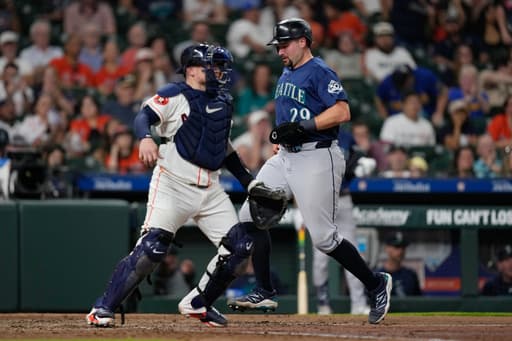 Mariners’ scuffling star catcher Cal Raleigh placed on 10-day injured list with right oblique strain