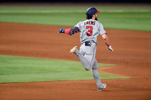 Washington Nationals' Dylan Crews runs after hitting a double during the fifth inning of a baseball game against the Miami Marlins, Saturday, Aug. 22, 2026, in Miami. (AP Photo/Michael Laughlin) (AP Photo/Michael Laughlin)