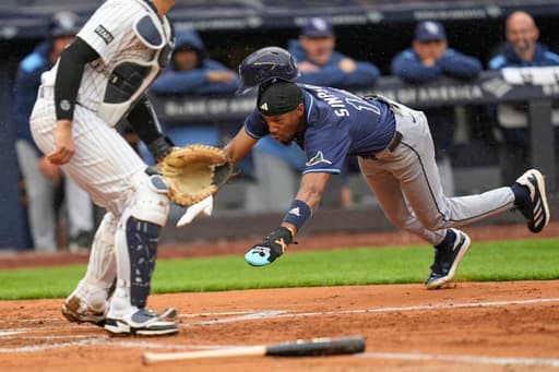 Rays rookie Chandler Simpson scores from second base on infield hit